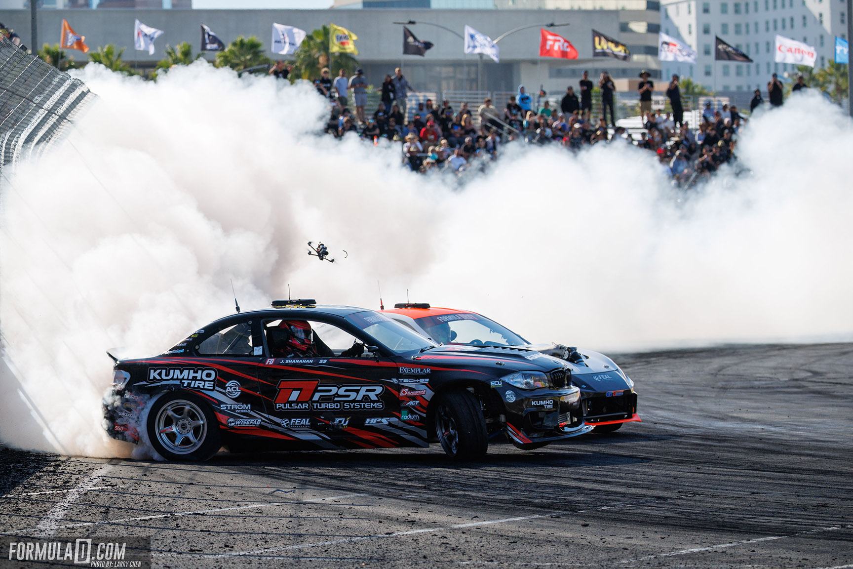 Jack Shanahan leads Aurimas Bakchis during a tandem drift run at Long Beach.