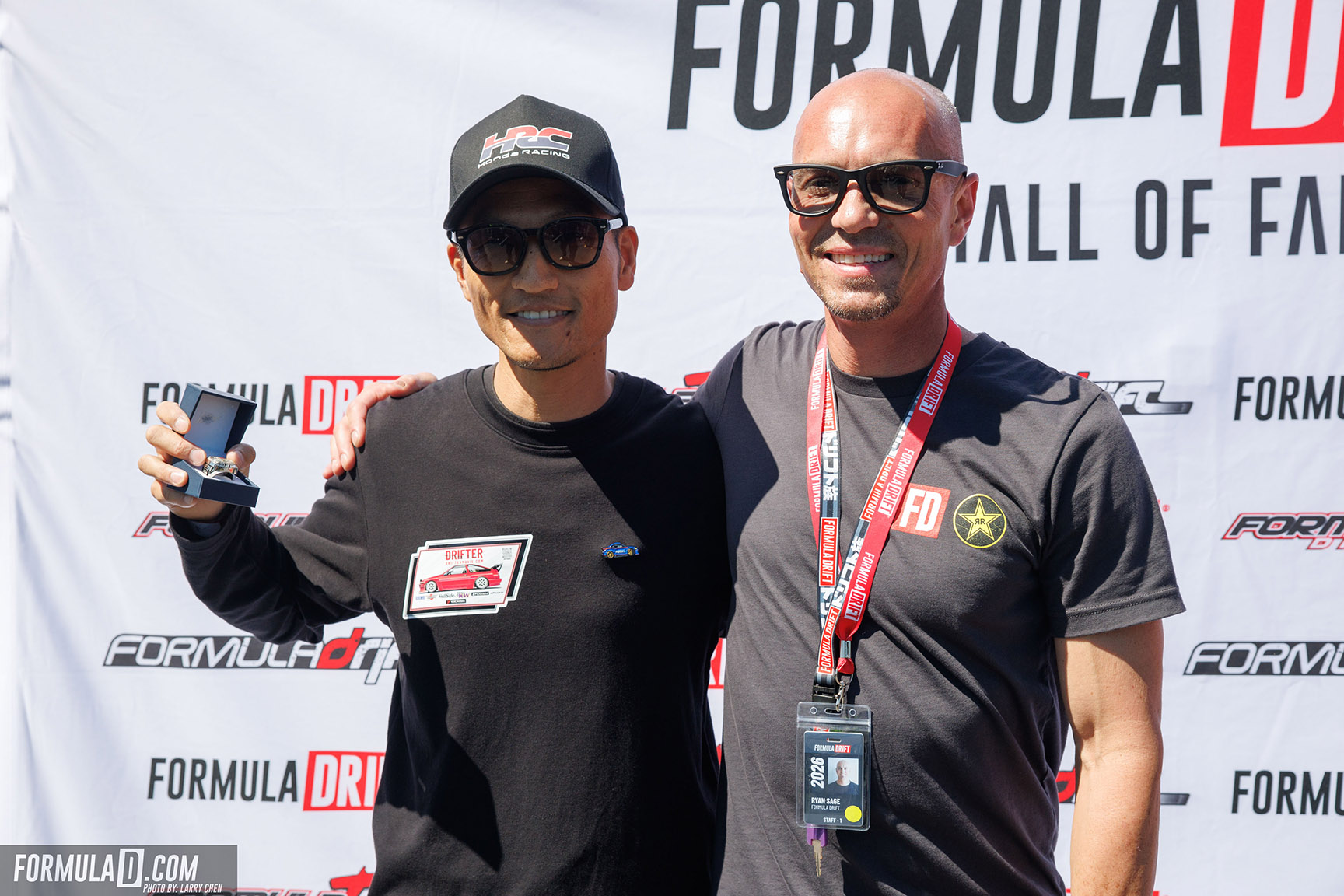 Formula DRIFT Hall of Fame moment with drivers posing for a commemorative photo.