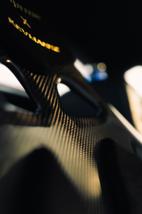 Close-up of Kevmannz carbon fiber seat in John Santos 1991 Toyota MR2 interior