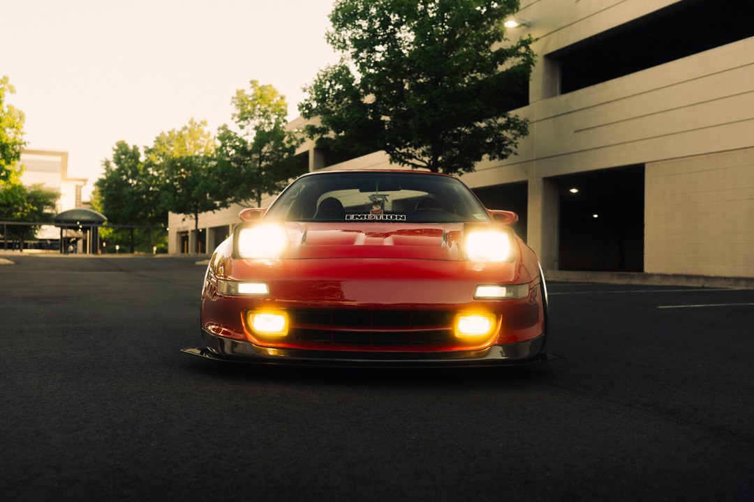 Front view of John Santos 1991 Toyota MR2 with pop-up headlights and yellow fog lights