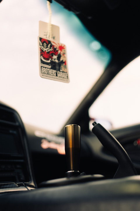 Custom shift knob and interior detail in John Santos 1991 Toyota MR2 with hanging air freshener