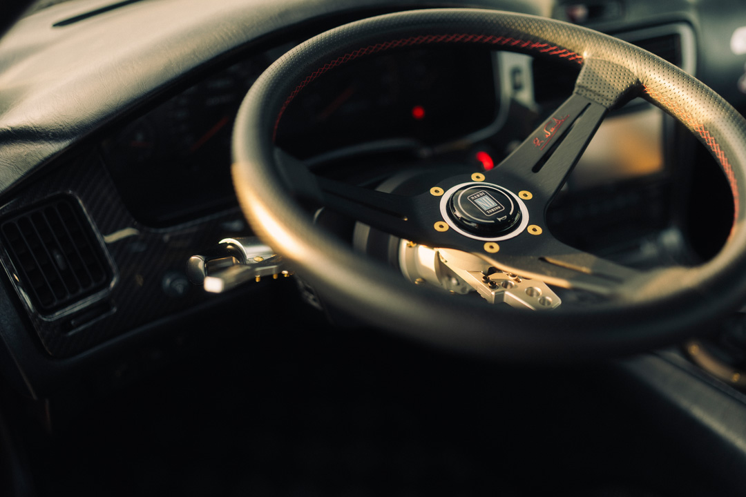 Nardi steering wheel detail in John Santos 1991 Toyota MR2 interior with quick release hub