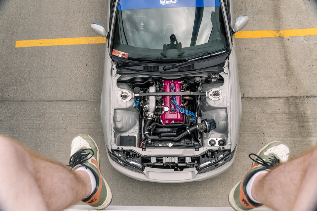 Bill MacKenzie’s Porsche Chalk 2000 Nissan Silvia S15 with handmade custom details, Nismo aero, Super Advan V2 wheels, naturally aspirated SR engine setup, and restomod-inspired interior and exterior work.