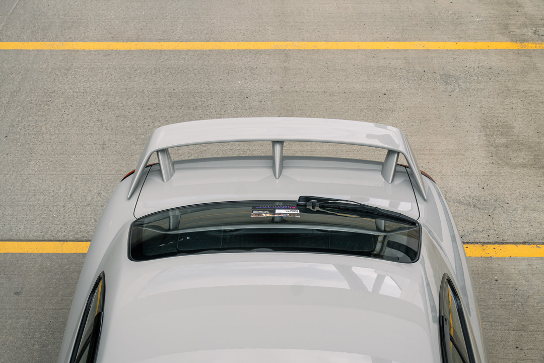 Bill MacKenzie’s Porsche Chalk 2000 Nissan Silvia S15 with handmade custom details, Nismo aero, Super Advan V2 wheels, naturally aspirated SR engine setup, and restomod-inspired interior and exterior work.