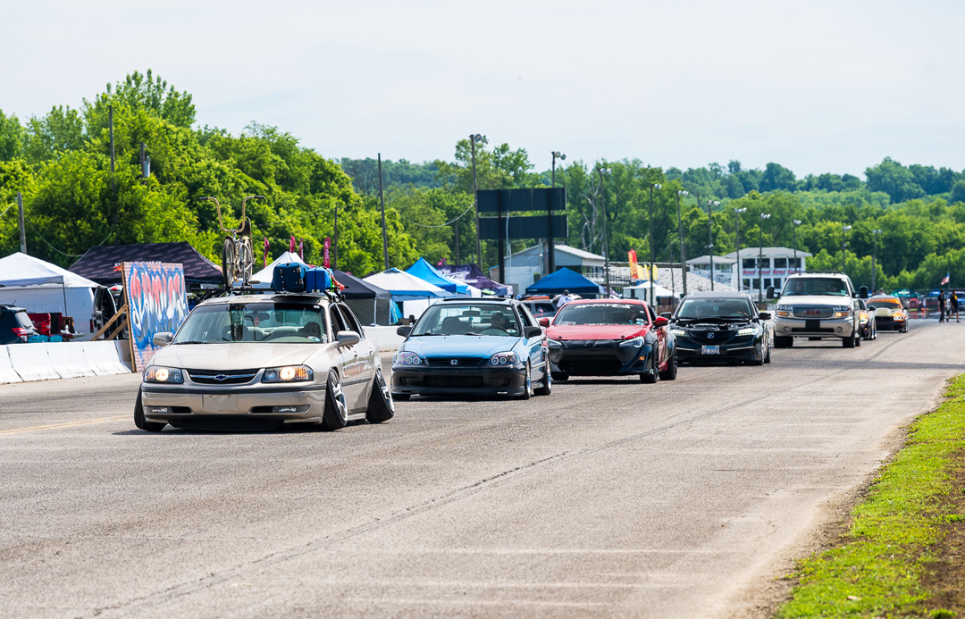 Custom vehicles cruise through Edgewater Sports Park during Slamology 2026 in Cleves, Ohio.