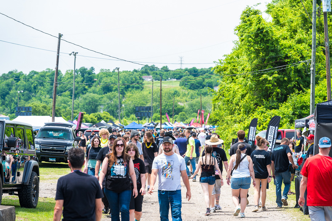 Crowd walking through the vendor and show area during Slamology 2026 at Edgewater Sports Park in Cleves, Ohio.
