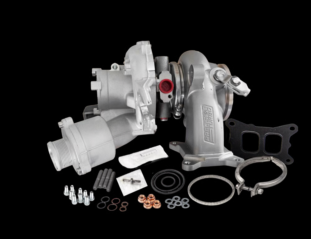 Precision Turbo Stage 1 MK7 Golf turbocharger kit with turbocharger, turbine housing, gaskets, clamps, hardware, and installation accessories.
