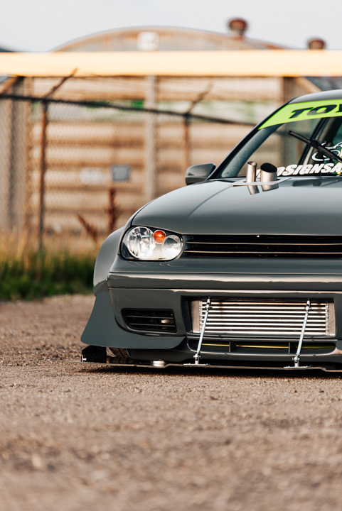Widebody Volkswagen Golf GTI show build photographed for PASMAG with custom aero, deep wheels, interior details, and JB MAF craftsmanship.
