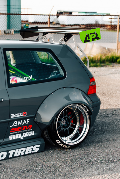 Widebody Volkswagen Golf GTI show build photographed for PASMAG with custom aero, deep wheels, interior details, and JB MAF craftsmanship.