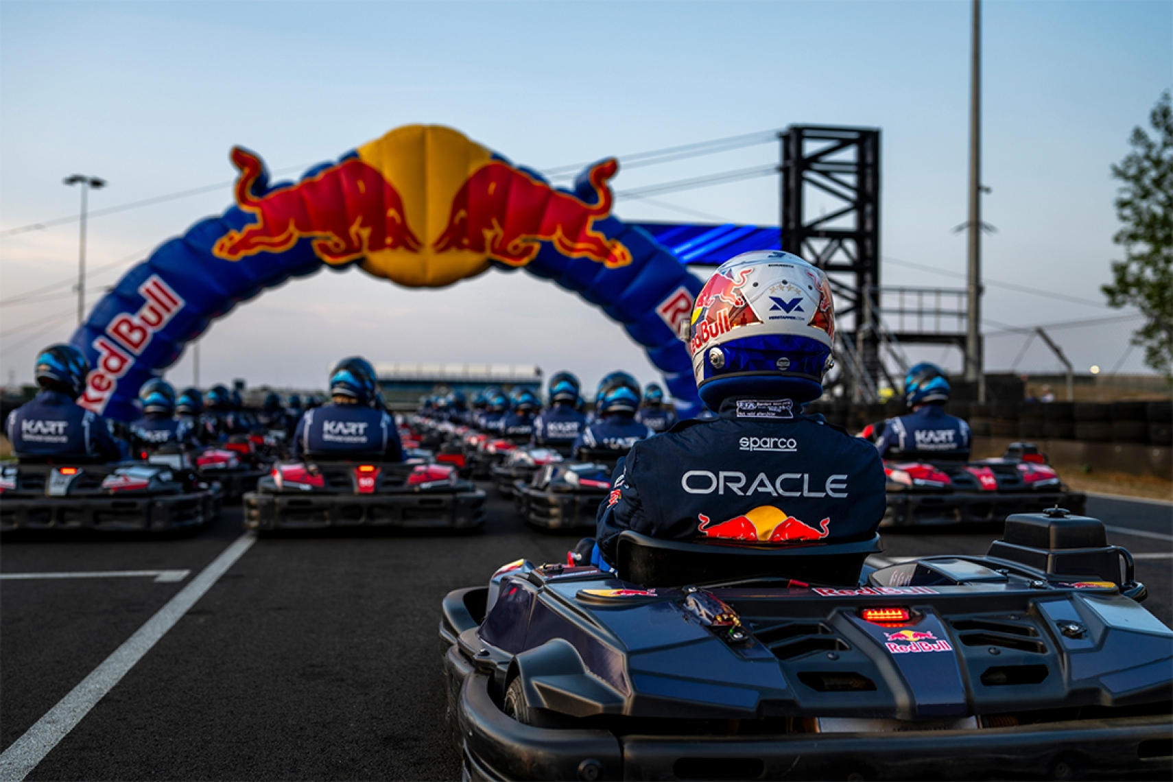 Max Verstappen lines up behind the 100-driver field for Red Bull Max vs 100 at Silverstone Circuit.