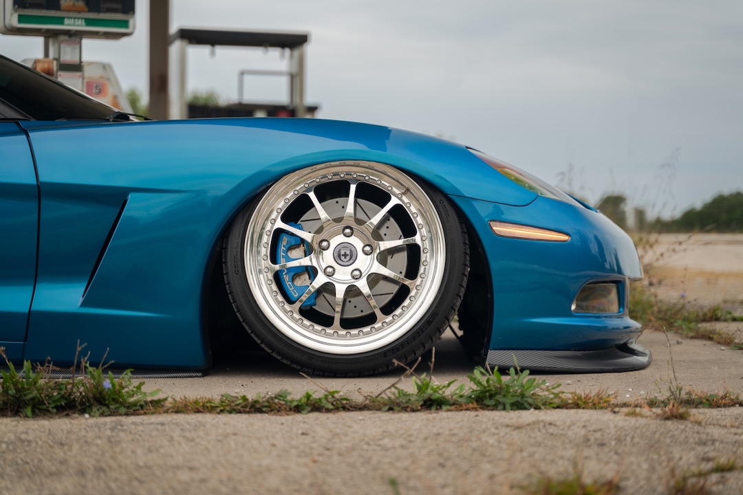 Close-up of Dane Shuler’s 2008 Chevrolet Corvette showing the HRE 543 three-piece front wheel and Power Stop brake setup.