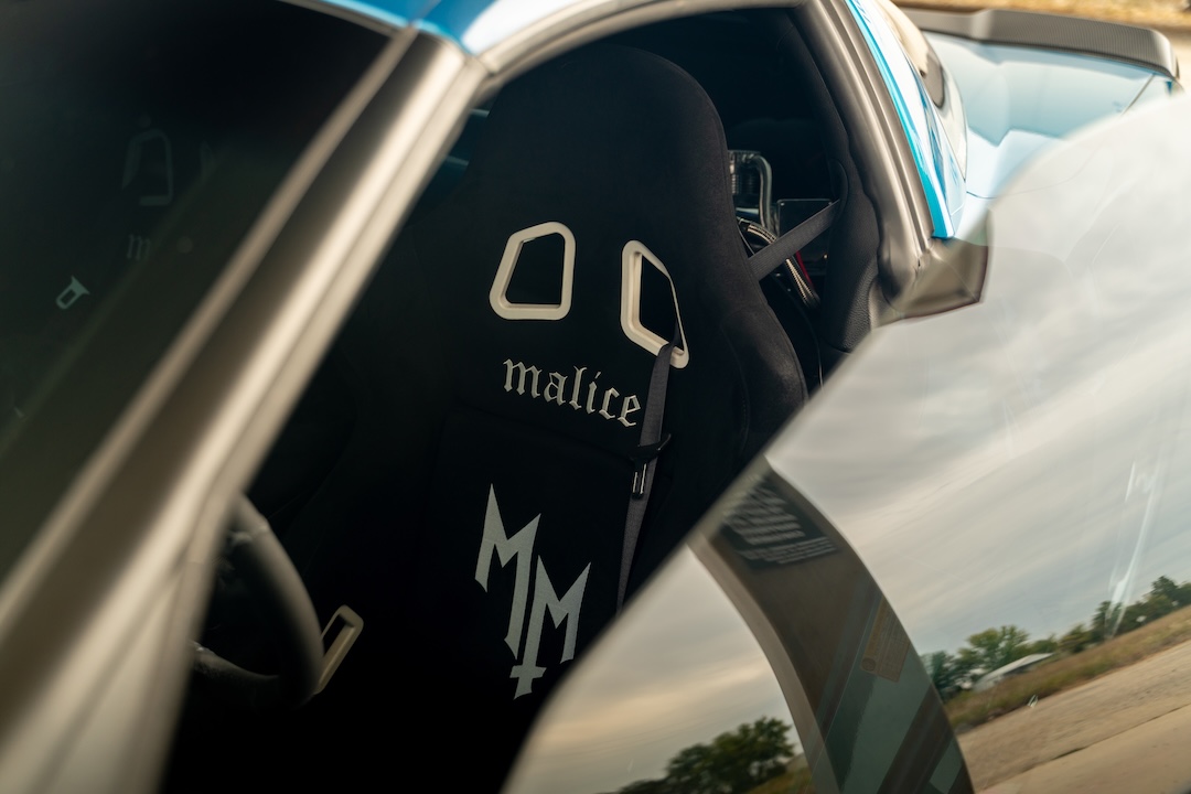 Malice carbon fiber bucket seat inside Dane Shuler’s 2008 Chevrolet Corvette.
