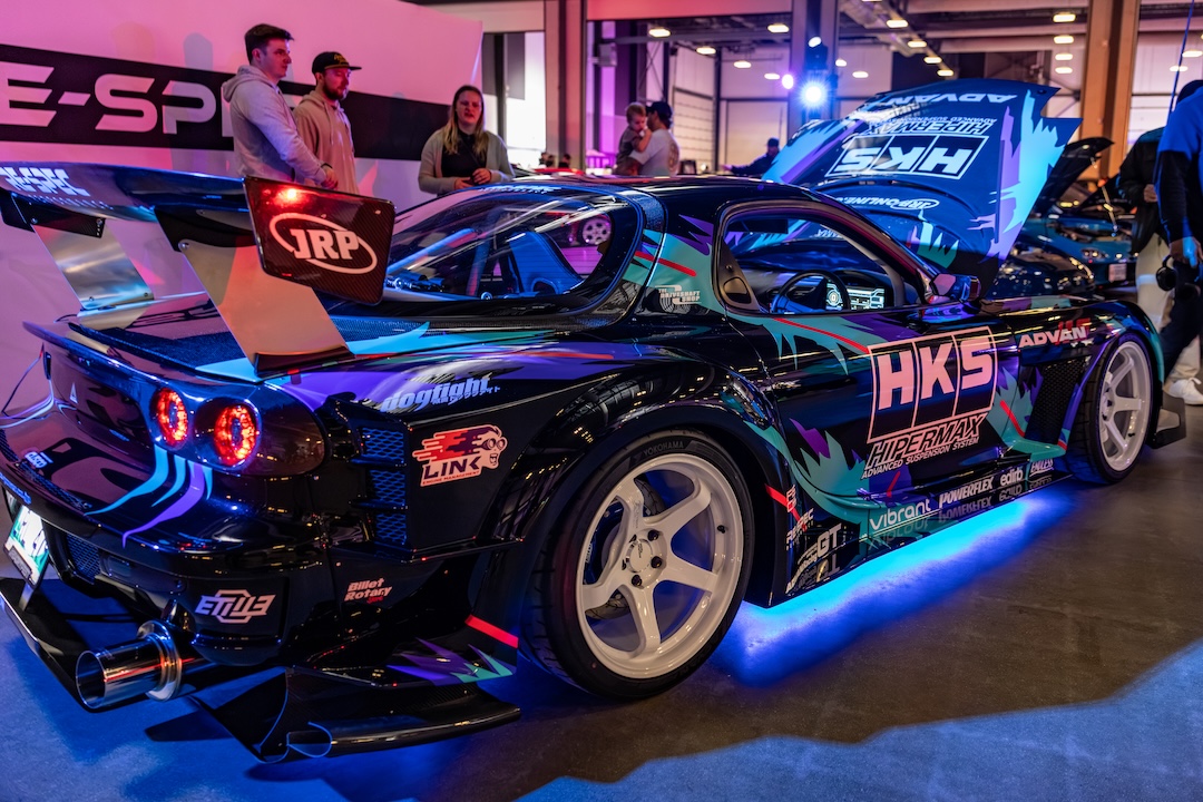 Rear view of Re-Spec Performance’s HKS-7 Mazda RX-7 at the 2026 Modified Automotive Show in Regina, Saskatchewan.