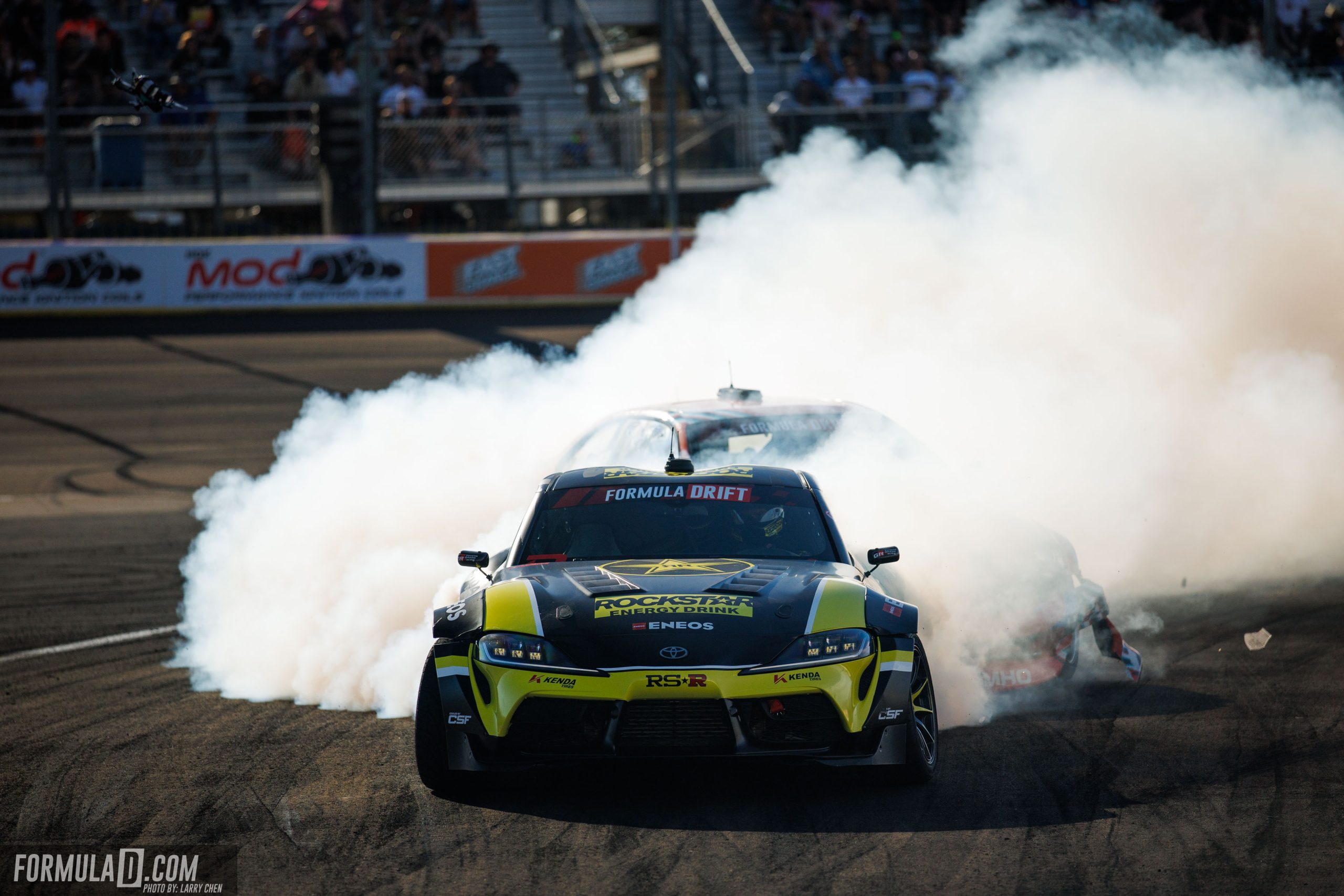 Fredric Aasbø drifting through a wall of tire smoke during Formula Drift Round 7 at Las Vegas Motor Speedway.